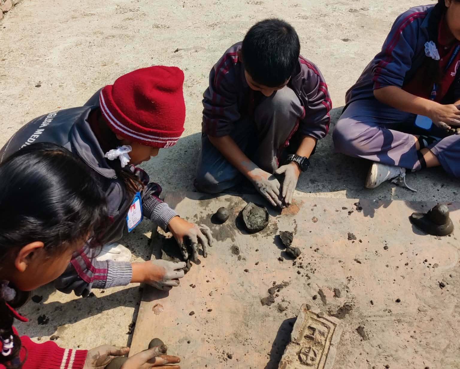 Nawakunja students creating pottery and clay art
